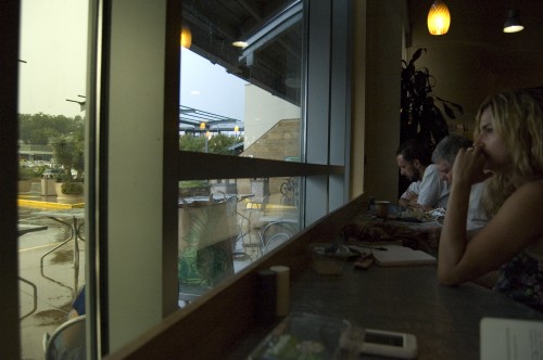 people watching the rain
